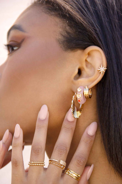 Cloud Pink Resin Hoop Earrings on a model