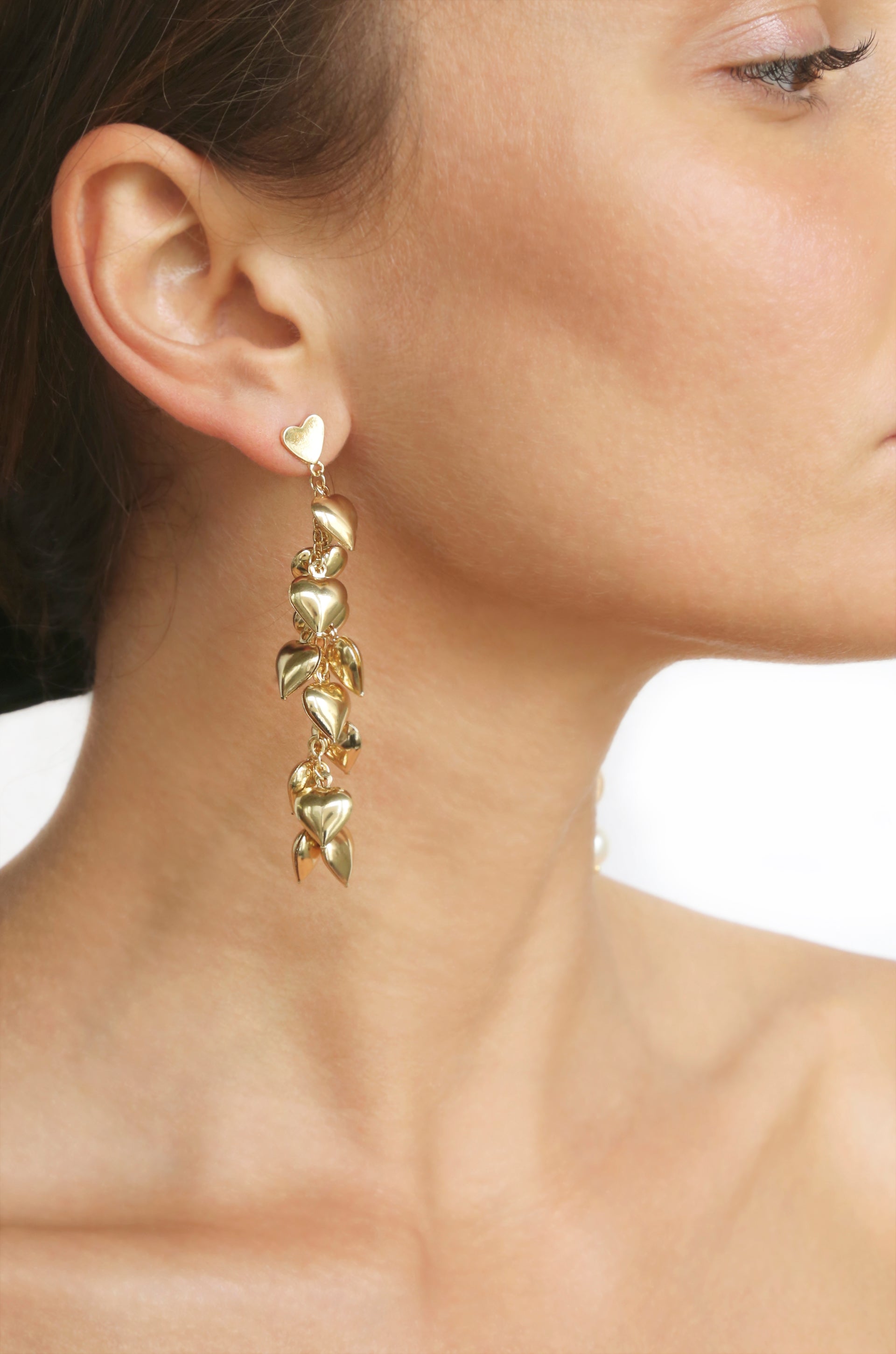 Heart Cluster 18k Gold Plated Drop Earrings shown on a model  