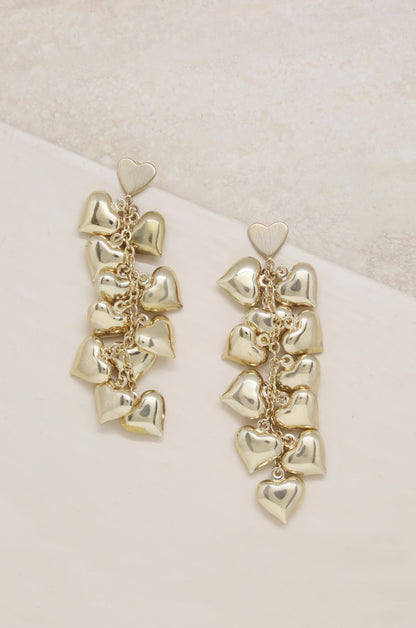 Heart Cluster 18k Gold Plated Drop Earrings on slate background  