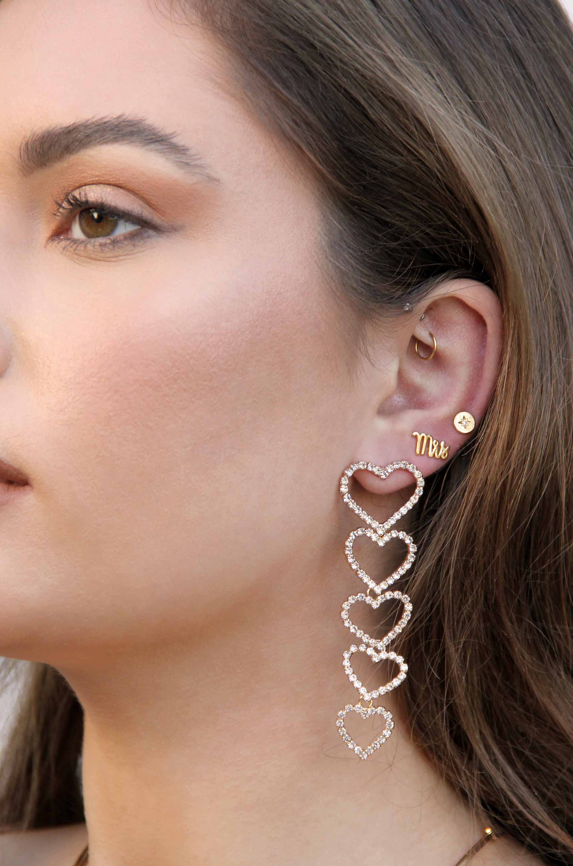 Mrs. 18k Gold Plated Earring Stud Set shown on a model  