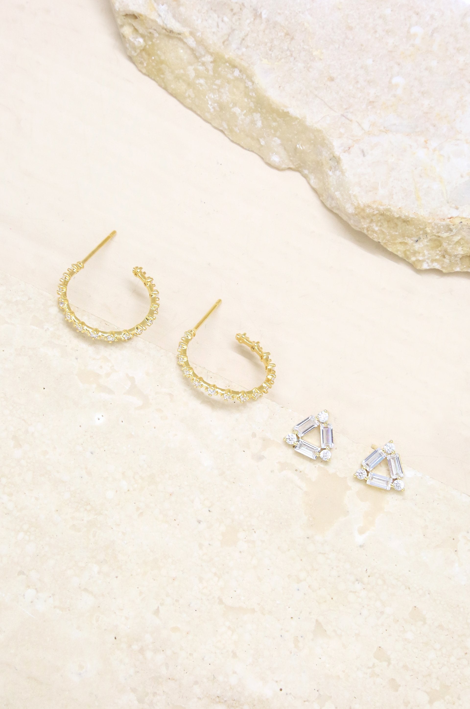 Triangle Crystal Stud & 18k Gold Plated Hoop Earring Set on slate background  