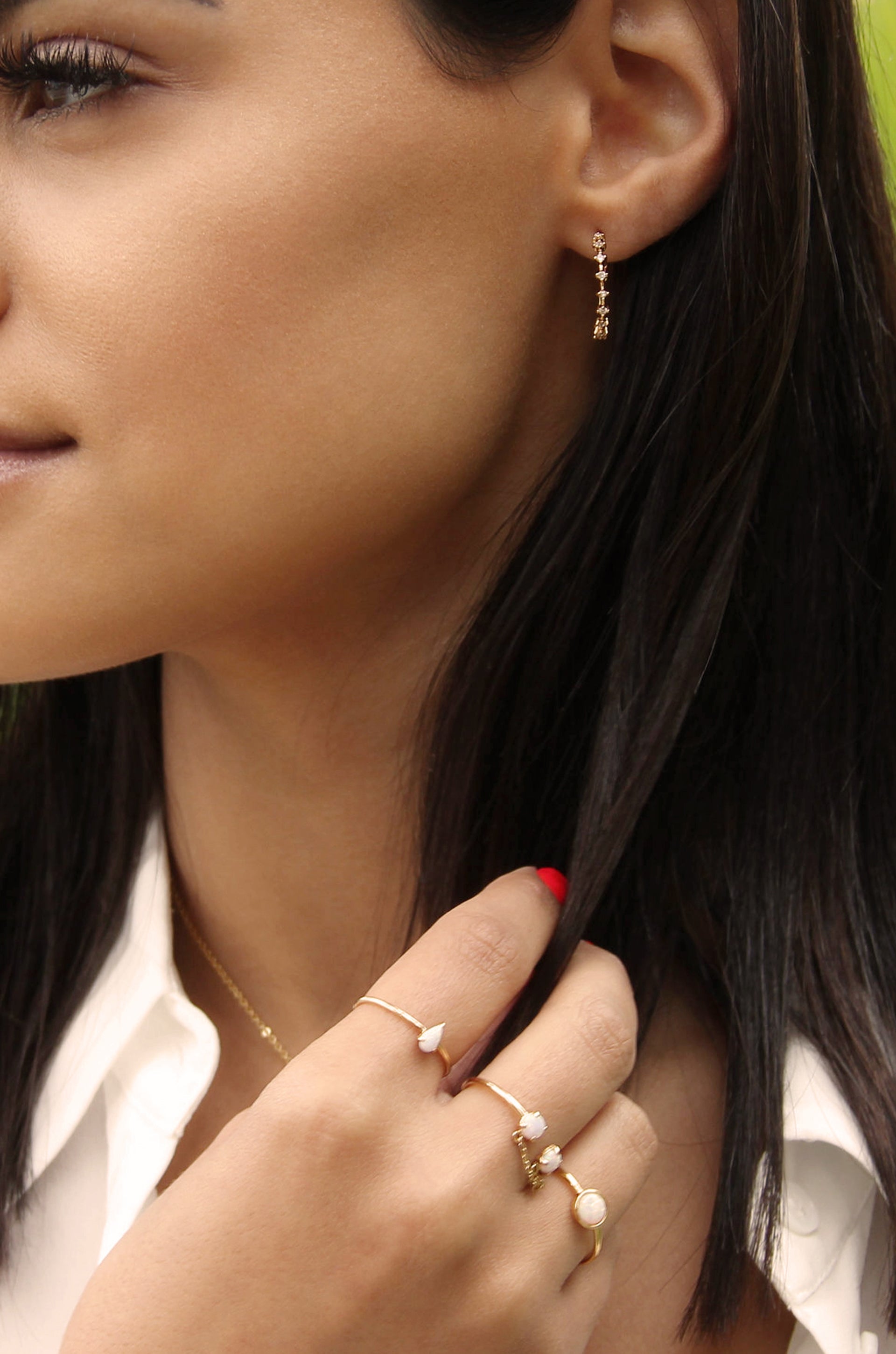 Triangle Crystal Stud & 18k Gold Plated Hoop Earring Set shown on a model  