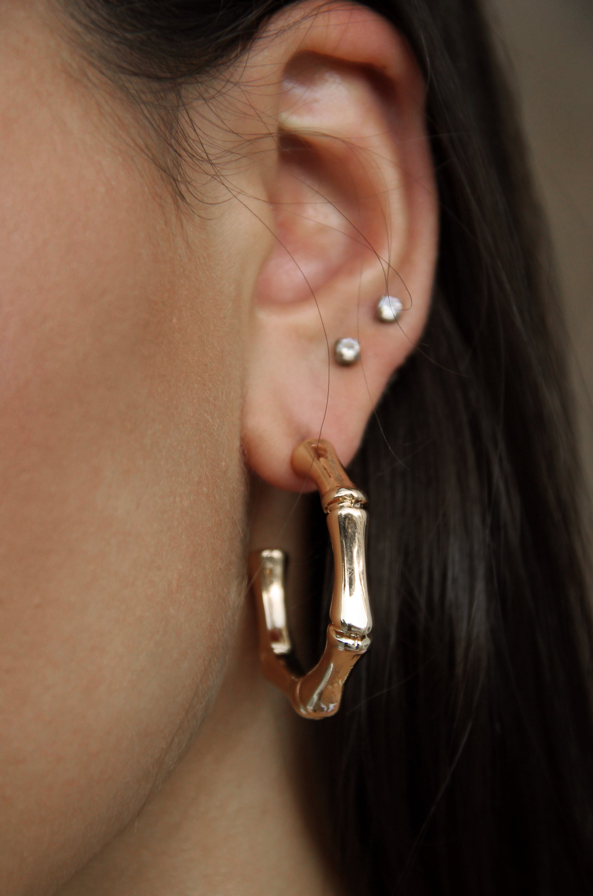 Golden Reign Hoop Earring Set shown on a model  
