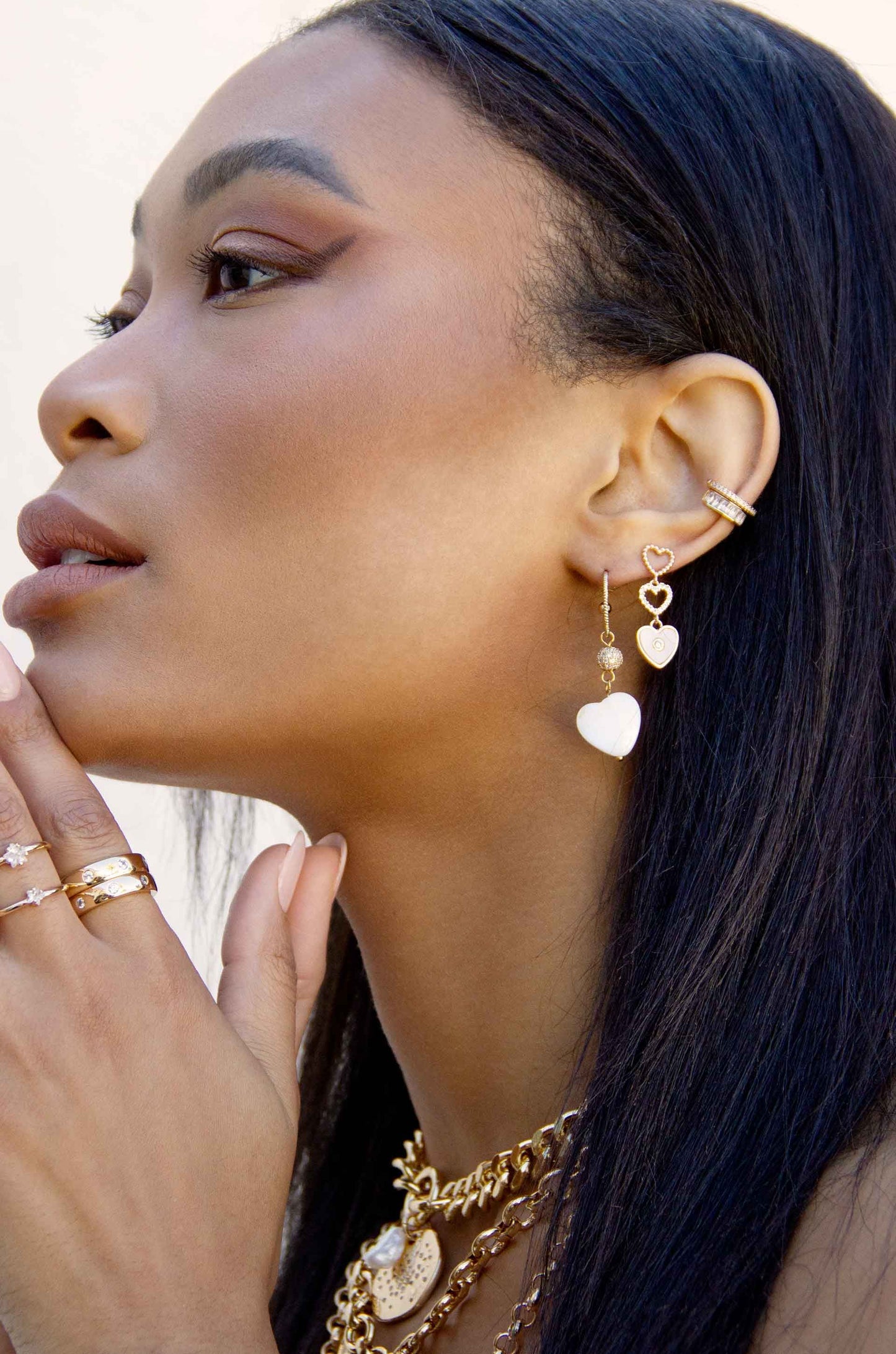 Mother of Pearl Heart 18k Gold Plated Earring Set on a model