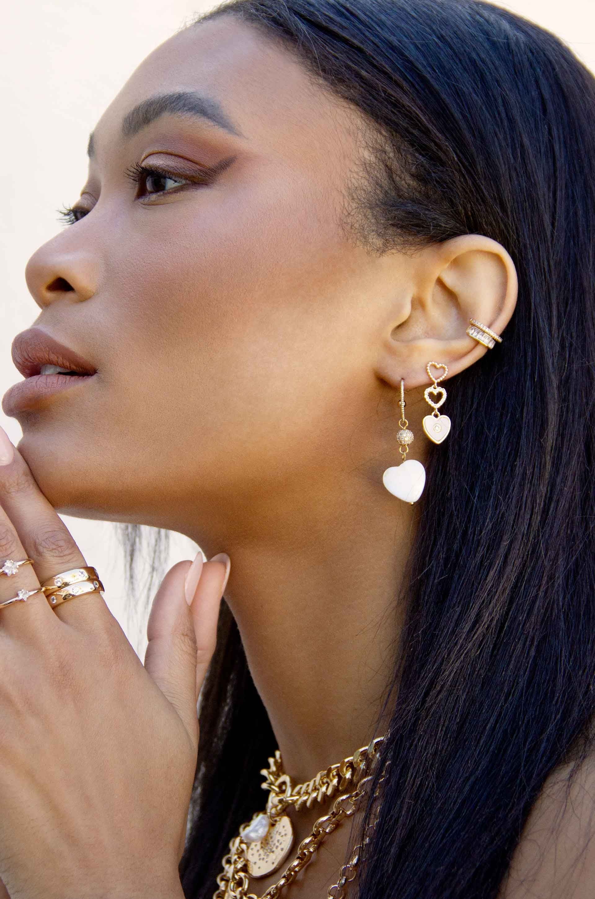 Mother of Pearl Heart 18k Gold Plated Earring Set on a model