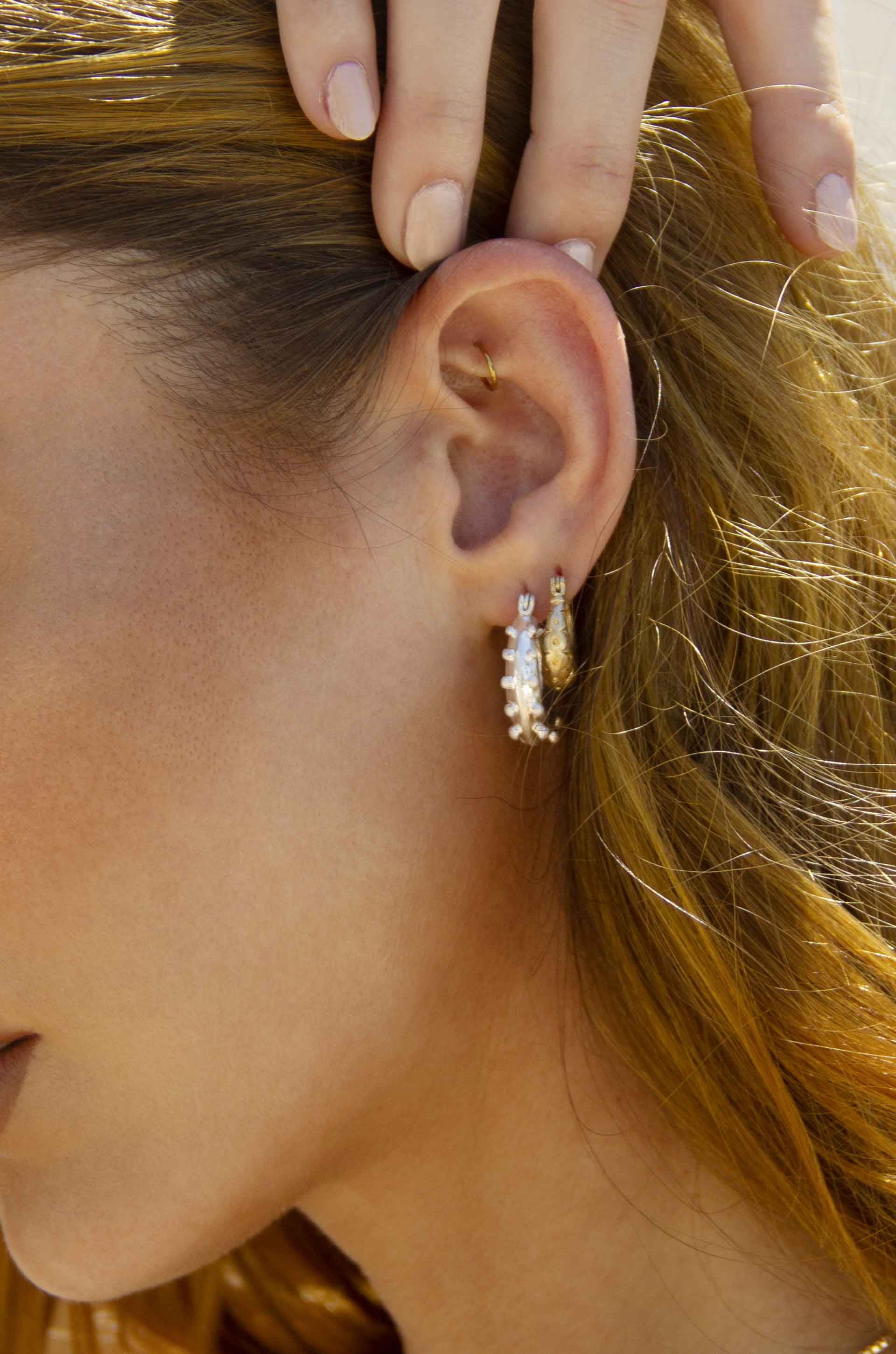 Old Friends New Friends Hoop Set in Worn Silver and Worn 18k Gold Plating on a model