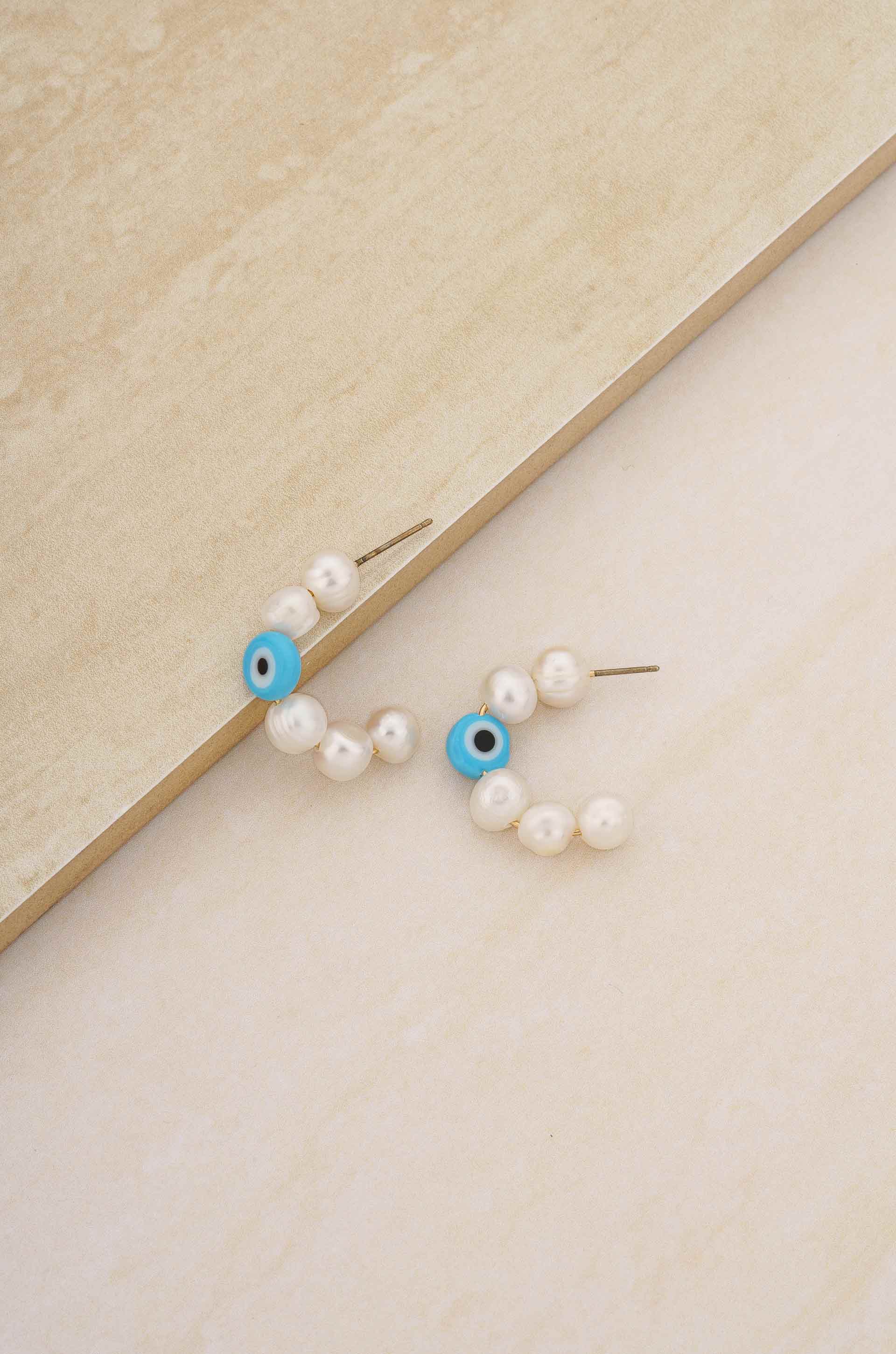 Evil Eye and Pearl Hoop 18k Gold Plated Earrings ON SLATE