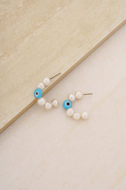 Evil Eye and Pearl Hoop 18k Gold Plated Earrings ON SLATE