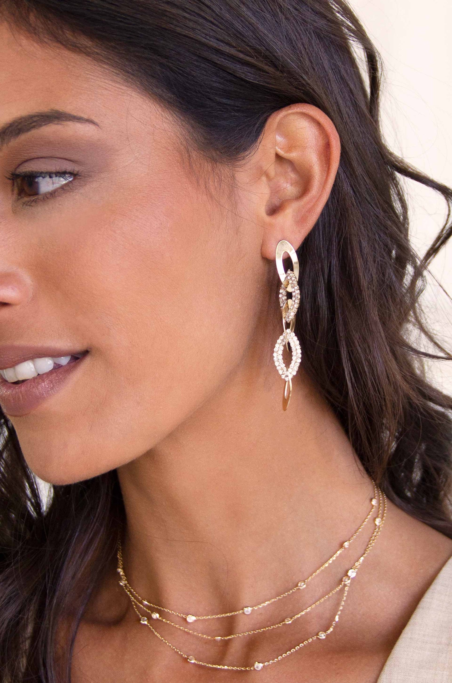 Crystal and 18k Gold Plated Rope Chain Link Dangle Earrings on a model