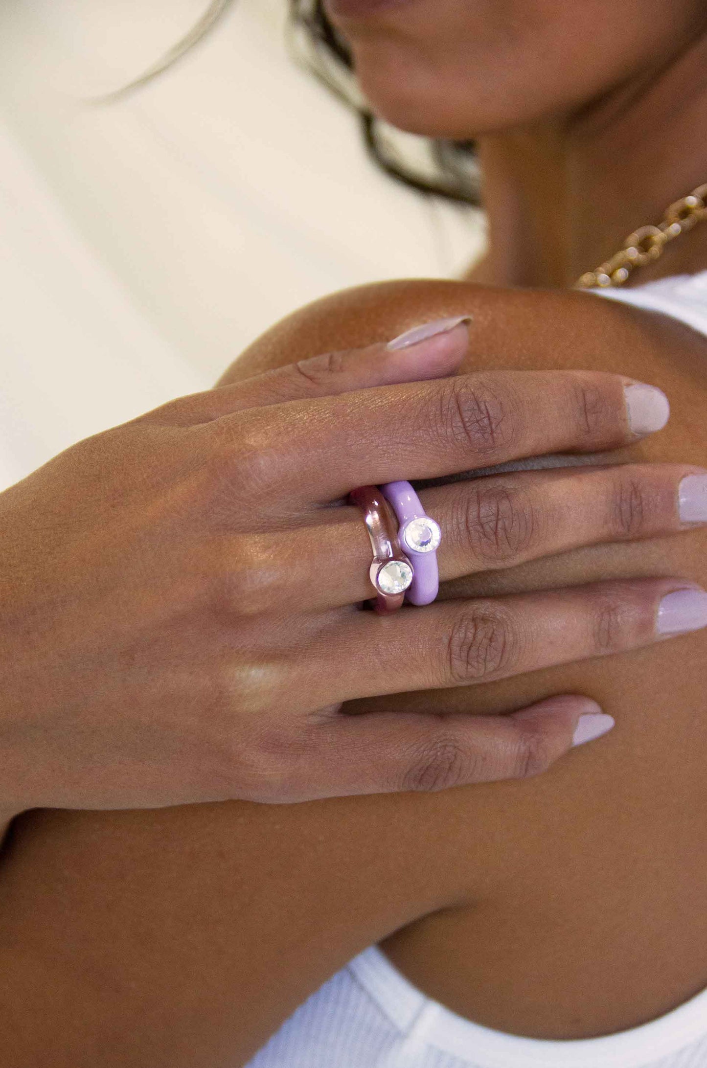 Transparent Pink & Matte Purple Resin Ring Set on a model