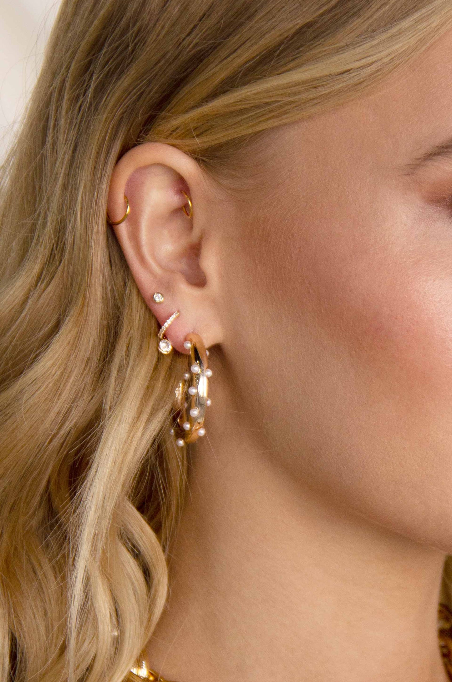 Spotted Pearl 18k Gold Plated Hoop Earrings on a model