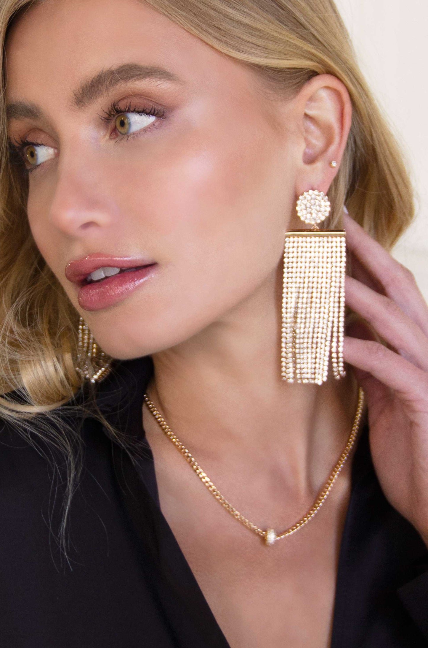 All the Movement Crystal Fringe 18k Gold Plated Earrings on a model