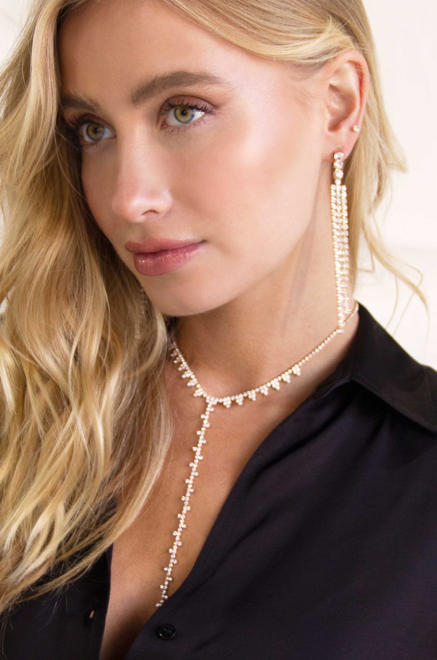 Deep Drop Crystal 18k Gold Plated Lariat Necklace on a model