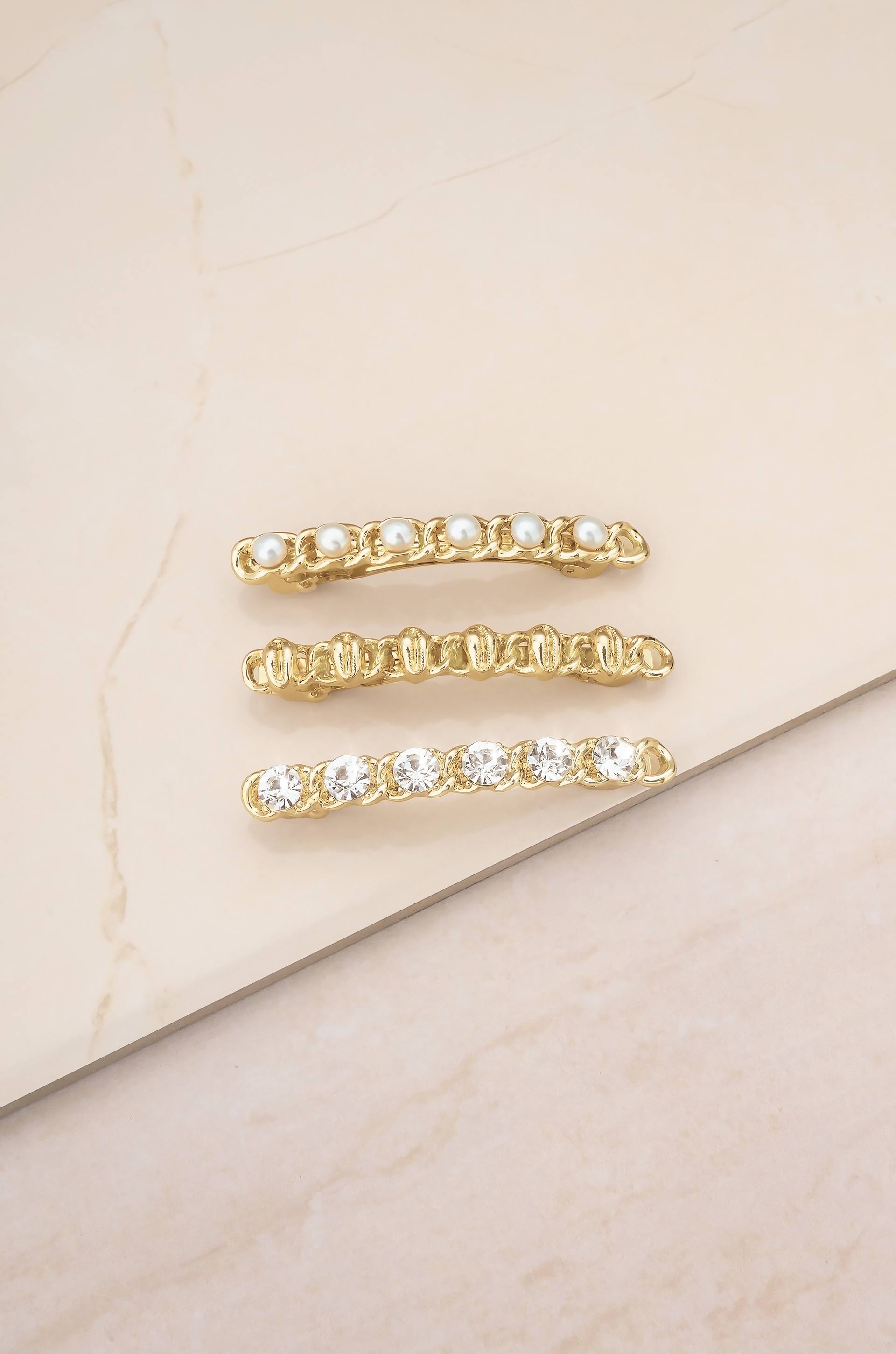 Gold Cowrie and Pearl Clip Set on slate