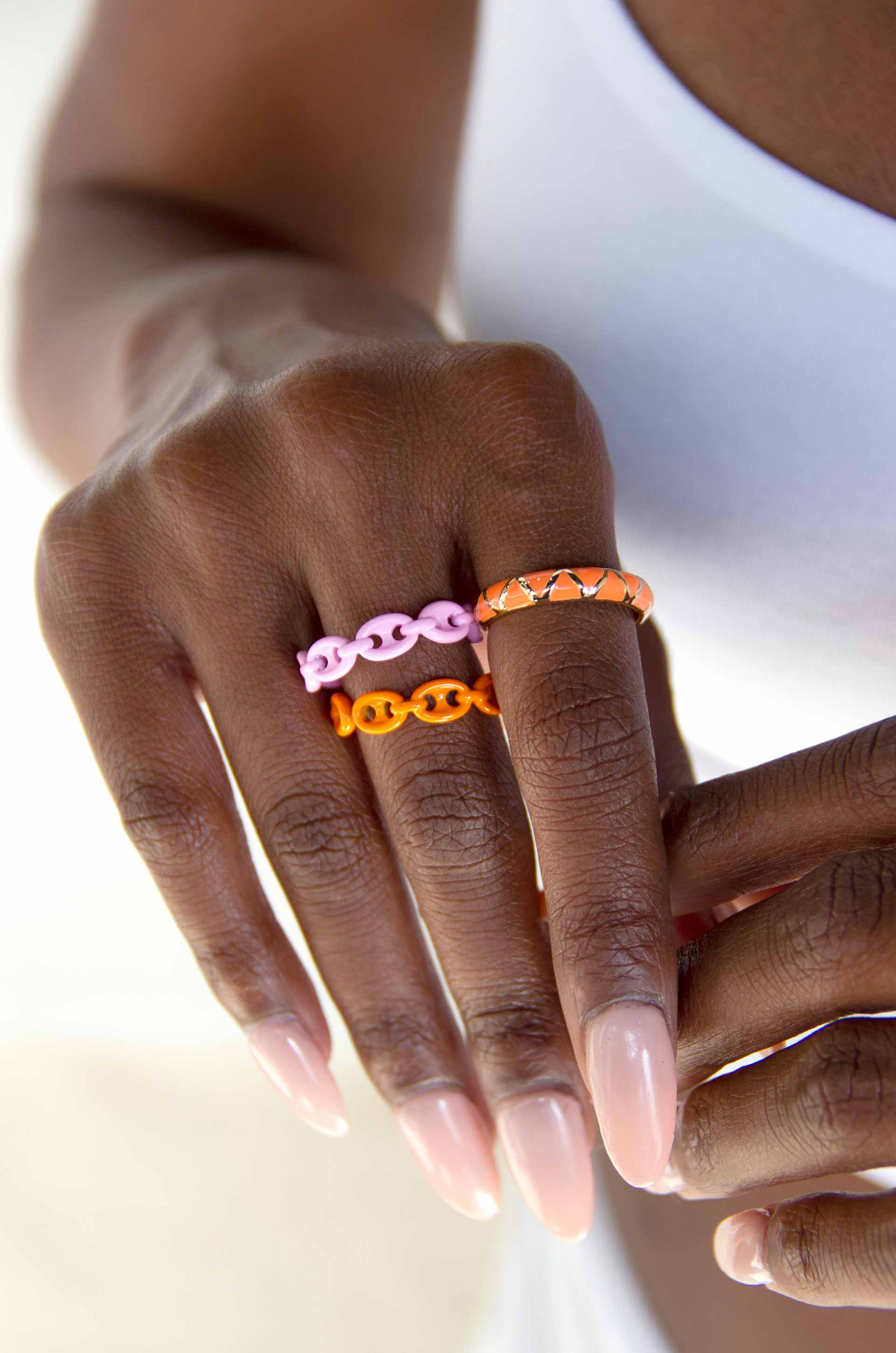 Festival Fun 18k Gold Plated Orange & Pink Enamel Ring Set on a model