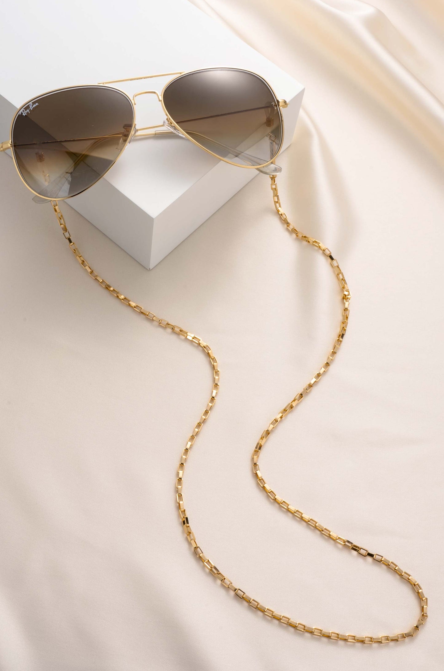 Golden Rays Rectangle Glasses Chain on slate
