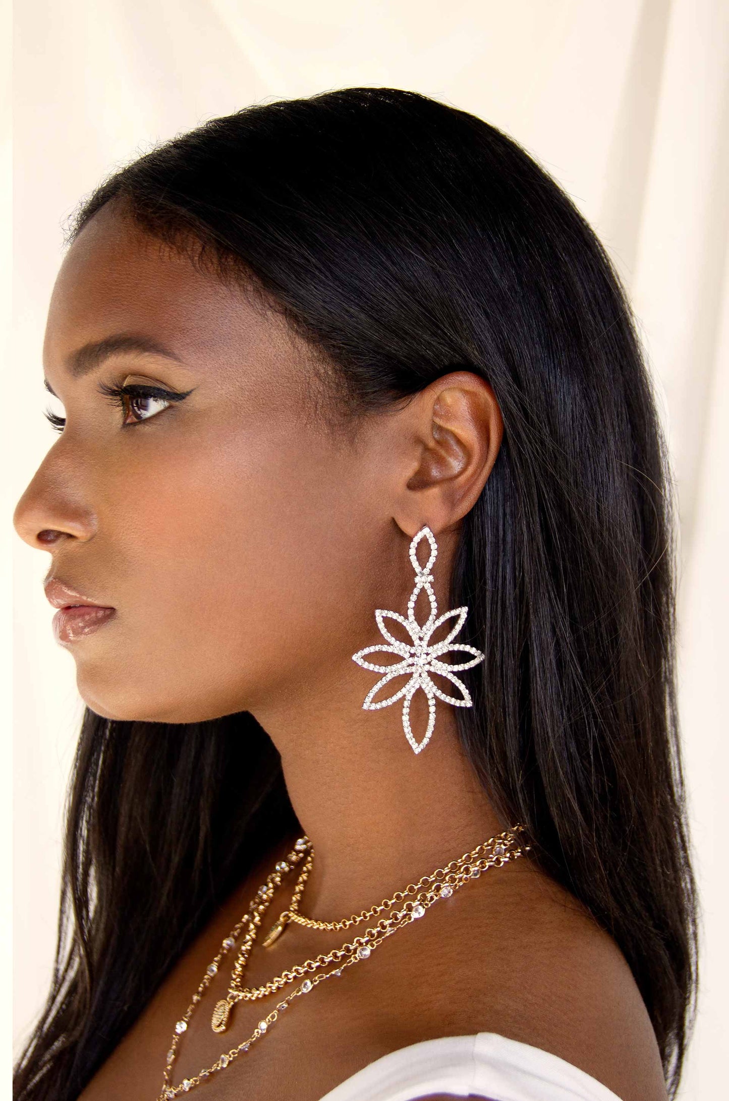 Crystal Bouquet Silver Plated Earrings on a model