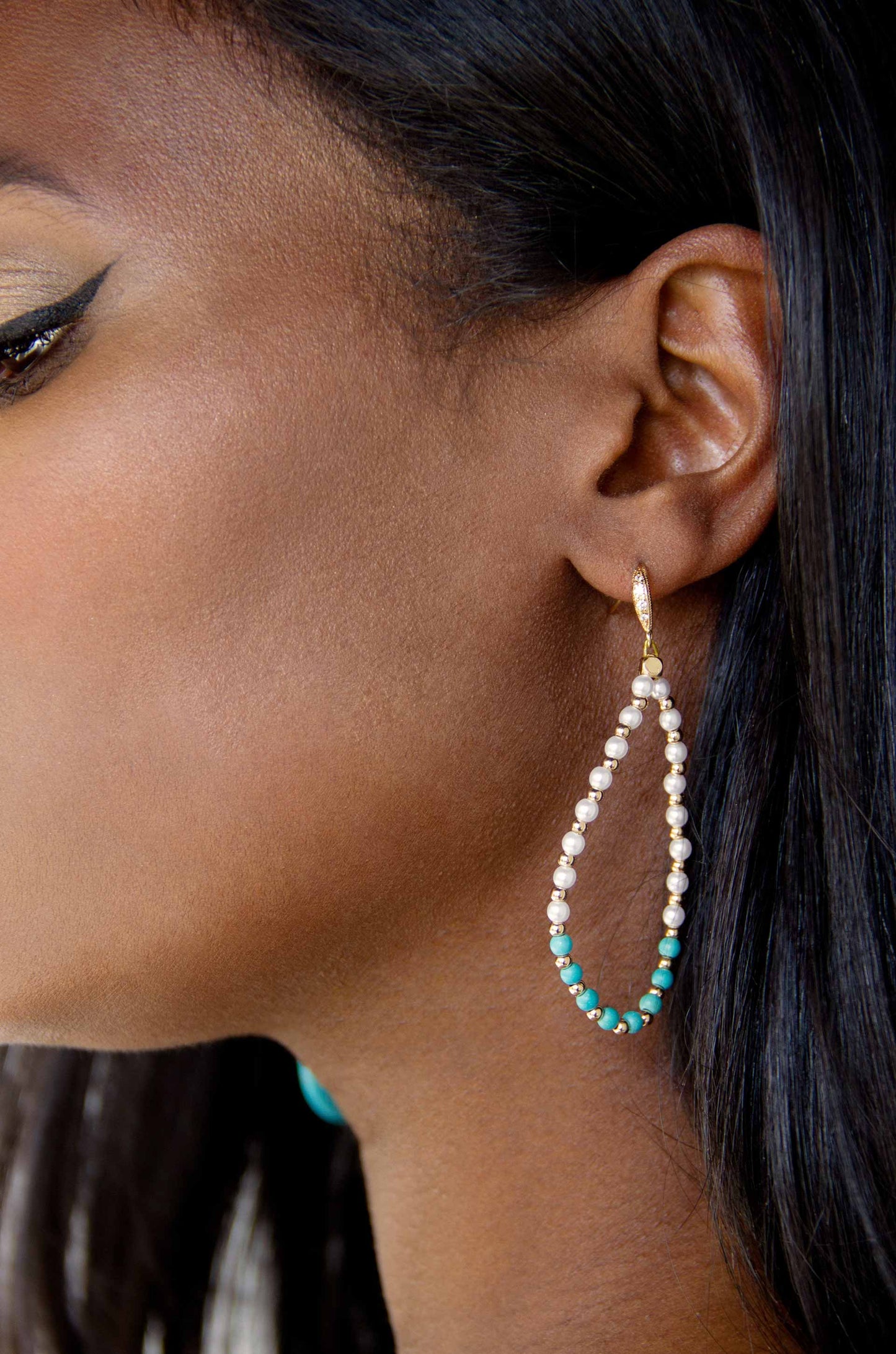 Turquoise and Pearl Teardrop 18k Gold Plated Drop Earrings on a model