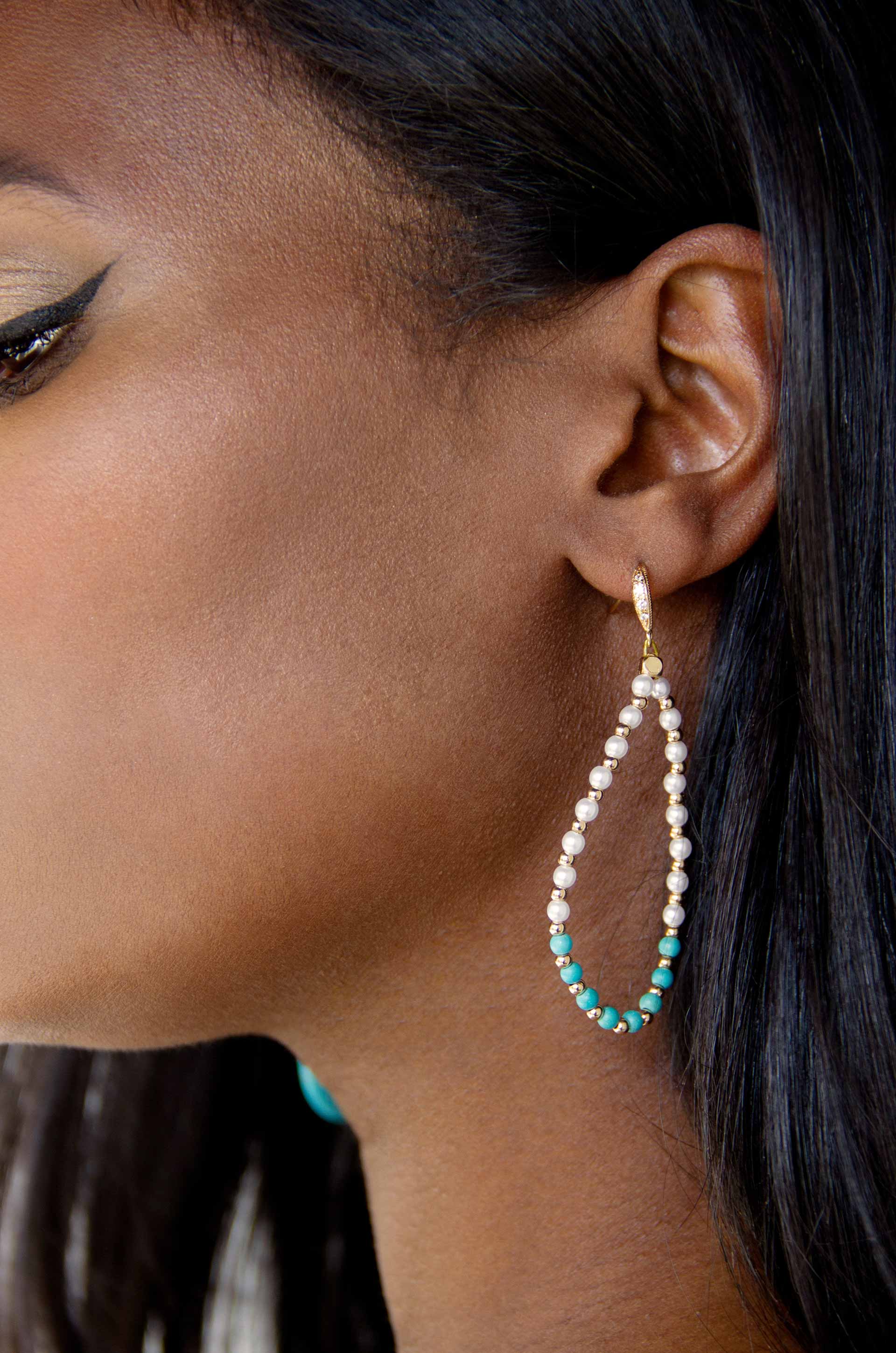 Turquoise and Pearl Teardrop 18k Gold Plated Drop Earrings on a model