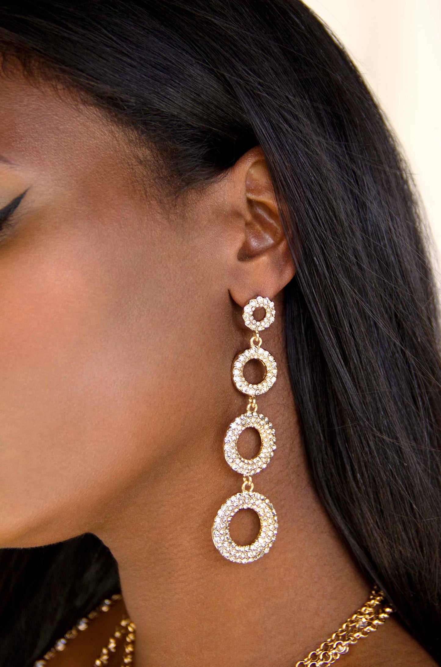Celebration Crystal 18k Gold Plated Dangle Earrings on a model