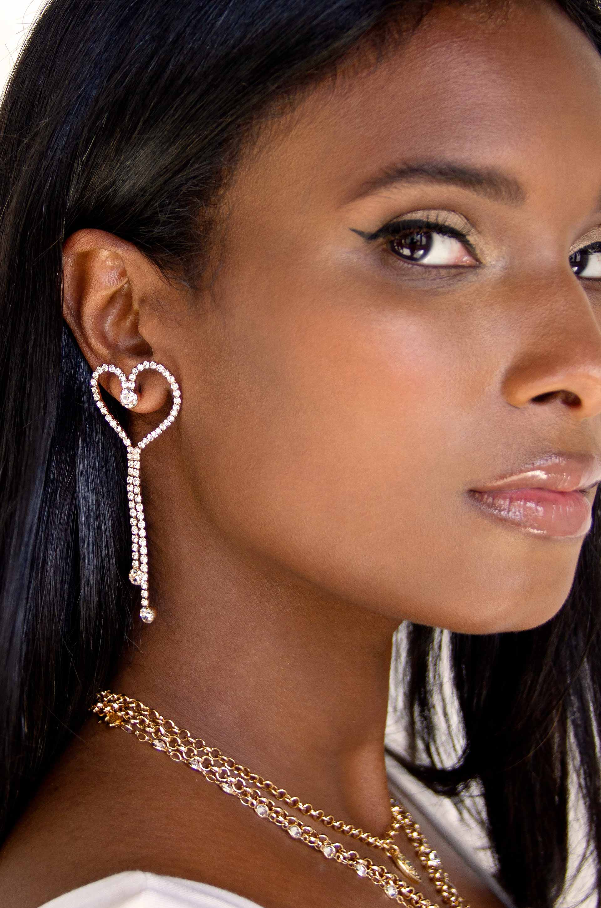 Crystal Heart Linear Drop Earrings on model