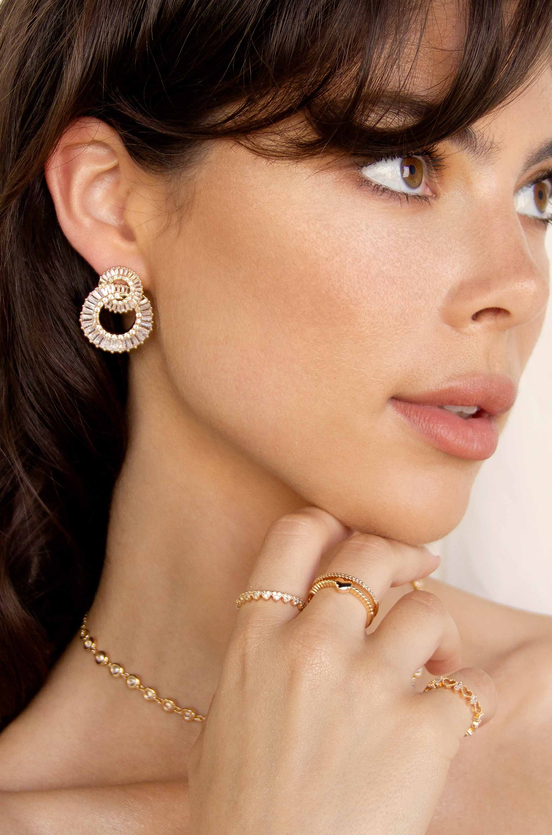 Rotating Circles 18k Gold Plated Crystal Earrings on a model
