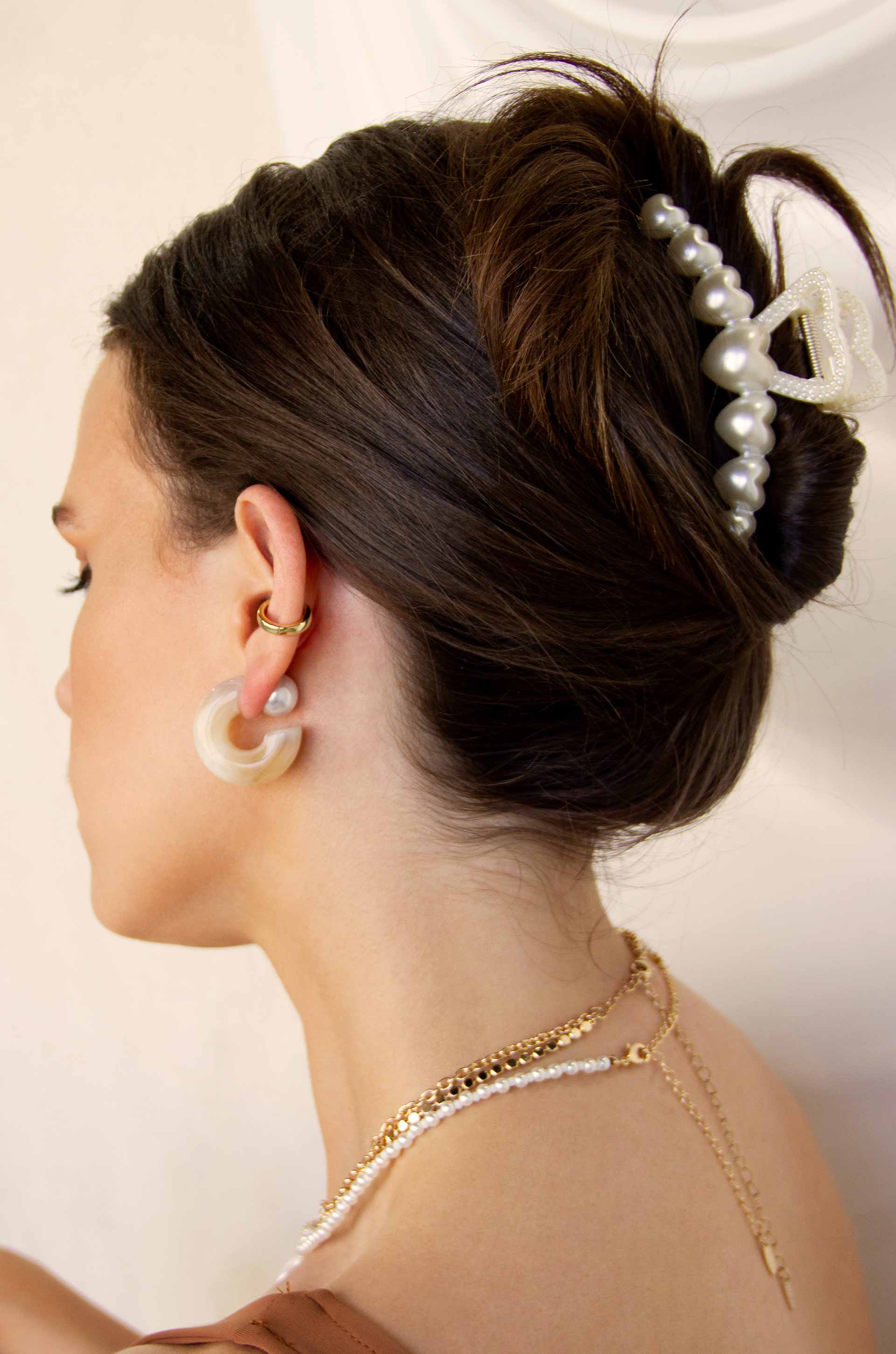 Multi-Heart Pearl Claw Clip on a model