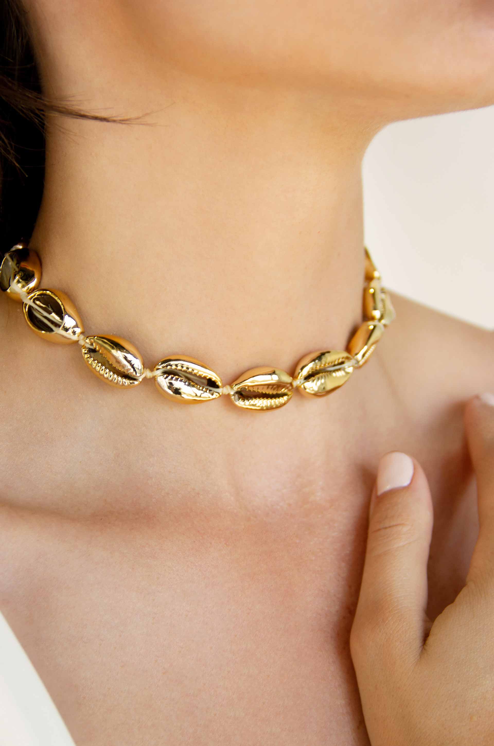 Cowrie Shell 18k Gold Plated Necklace on a model