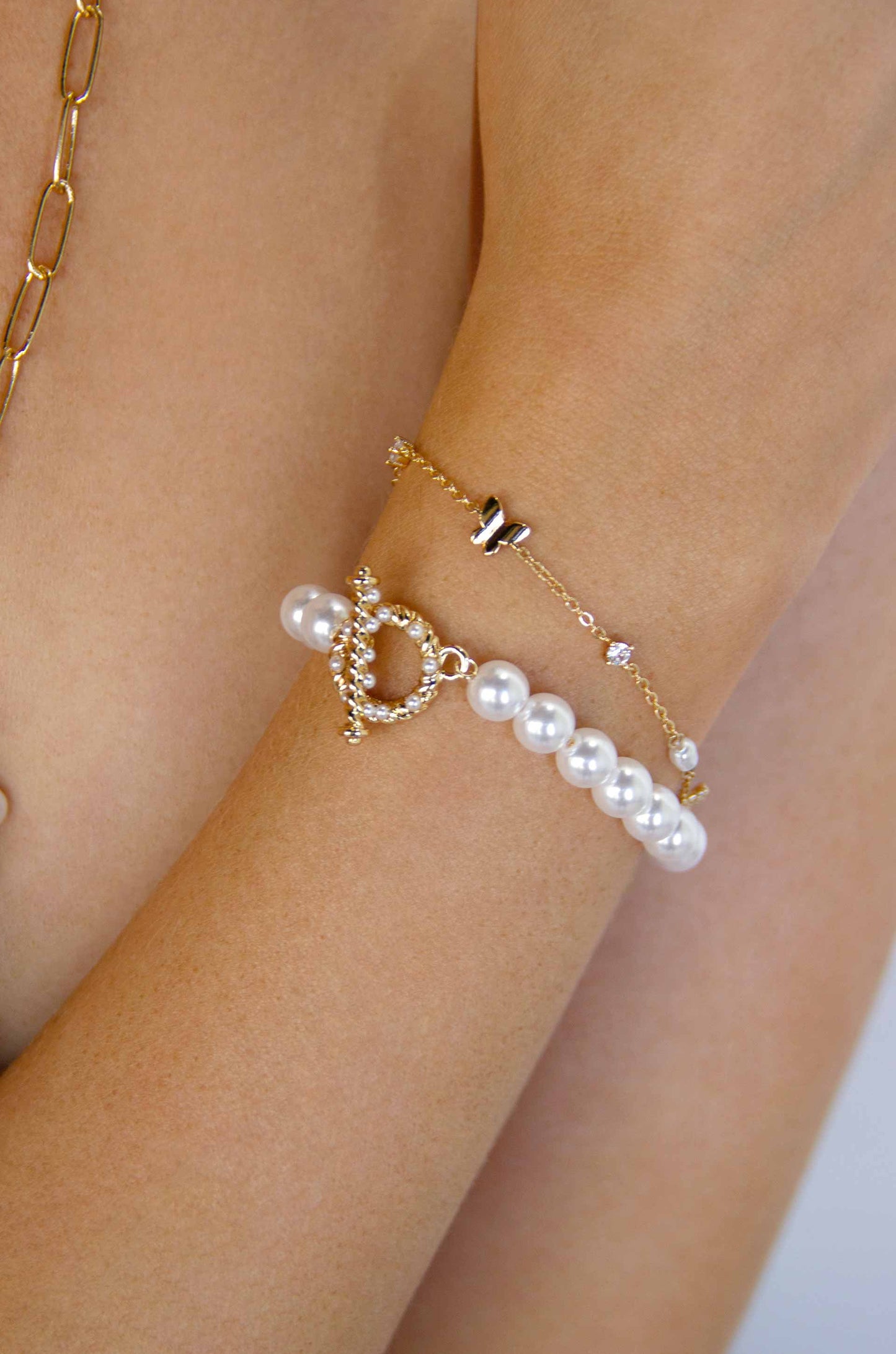 Subtle Butterflies and Pearl 18k Gold Plated Bracelet on model