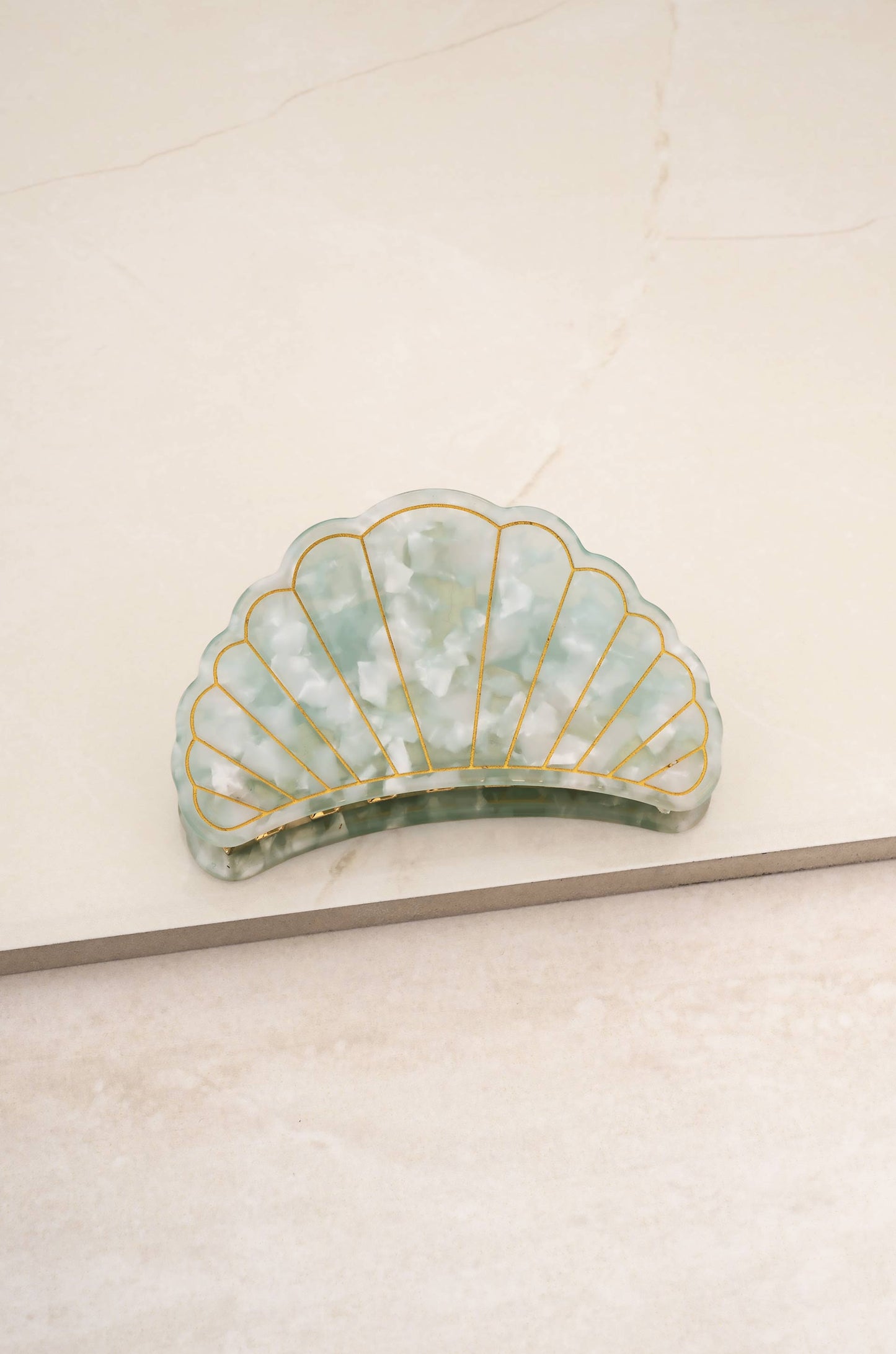 Sea Siren Shell Hair Claw on slate
