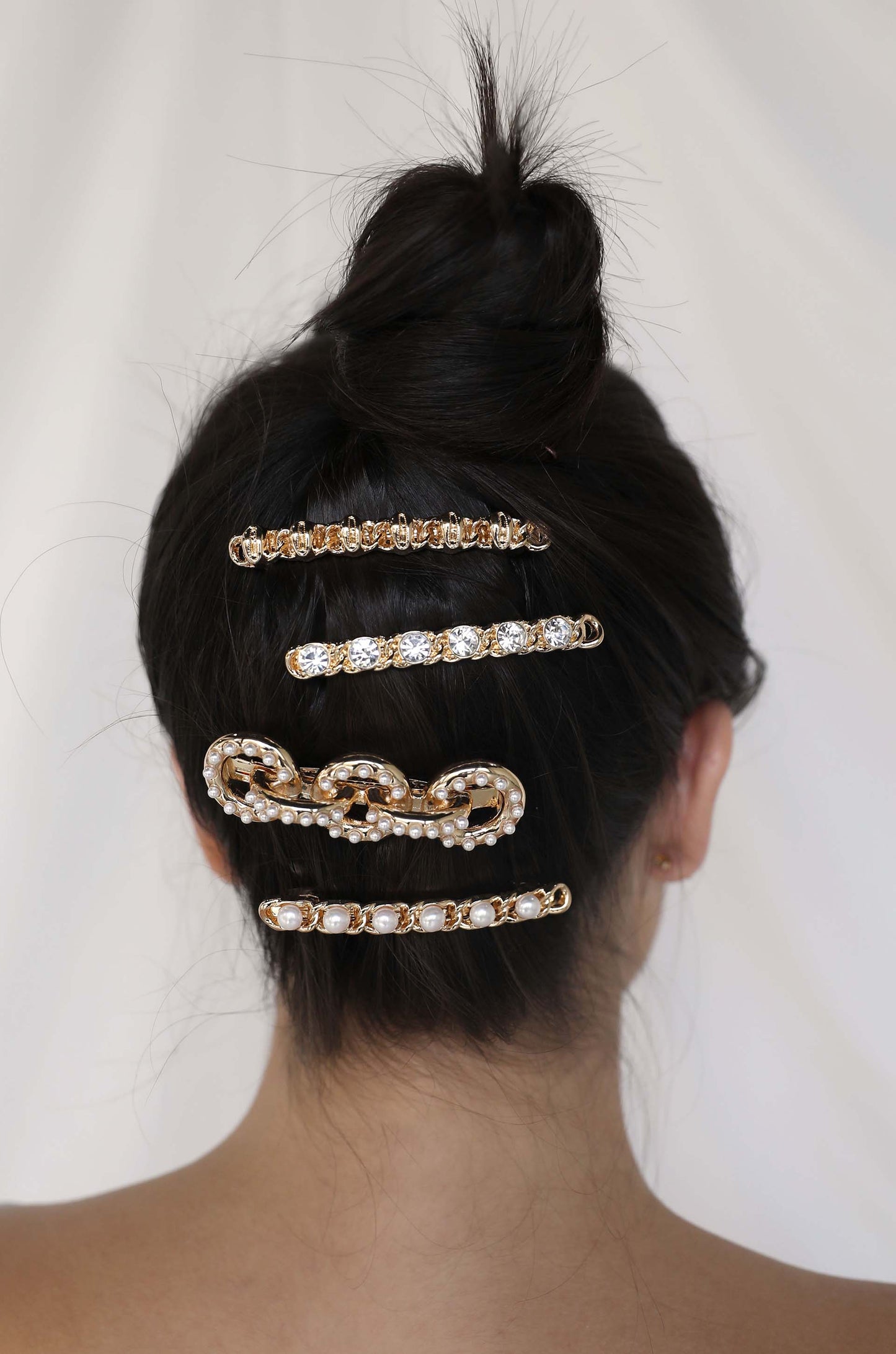 Gold Cowrie and Pearl Clip Set on model