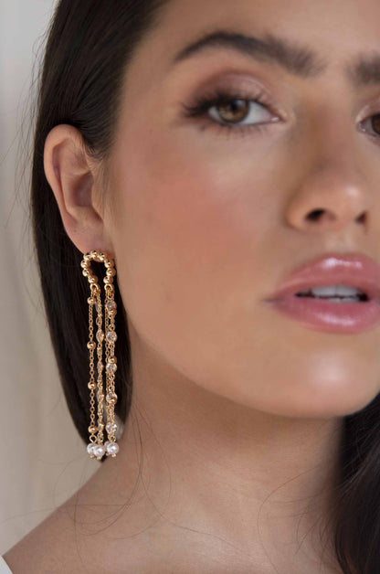 Pearly Gates 18k Gold Plated Earrings on a model