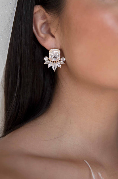 Shine Crystal 18k Gold Plated Stud Earrings on a model