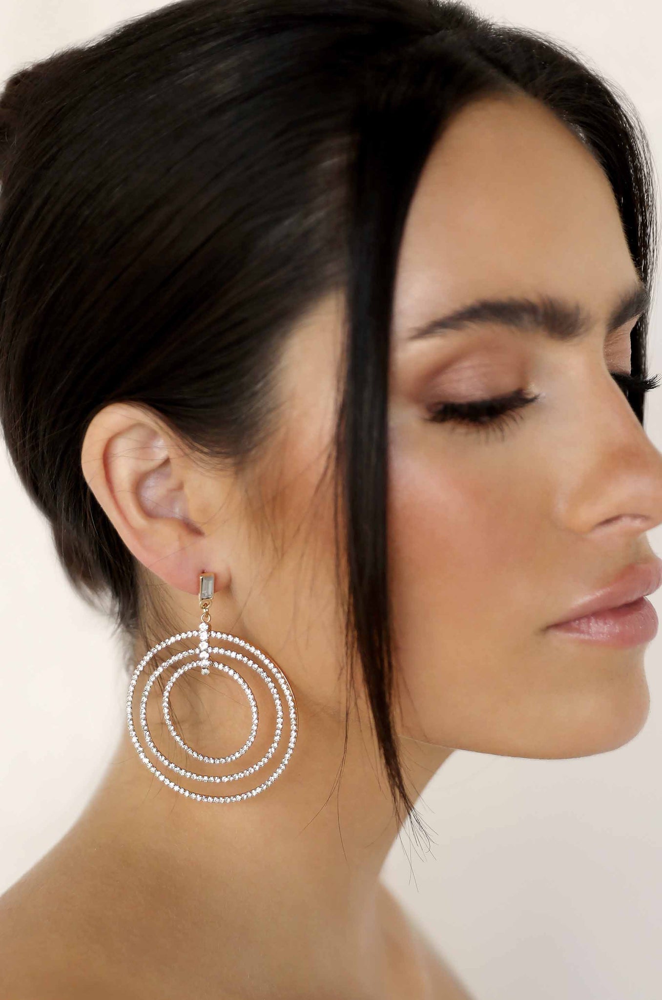 Disco Crystal Ring 18k Gold Plated Earrings on a model