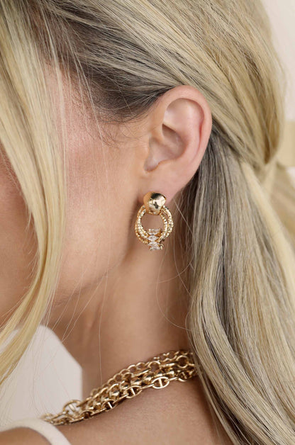 Mini Barrel 18k Gold Plated Crystal Earrings on a model
