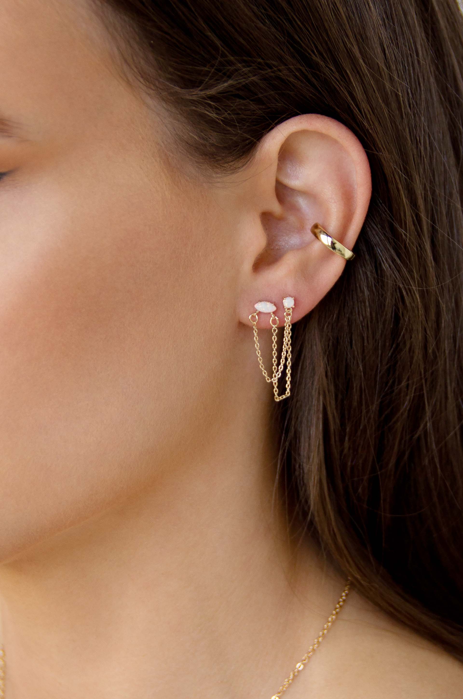 Two Hole Piercing Chain Dangle Earrings in opal on model