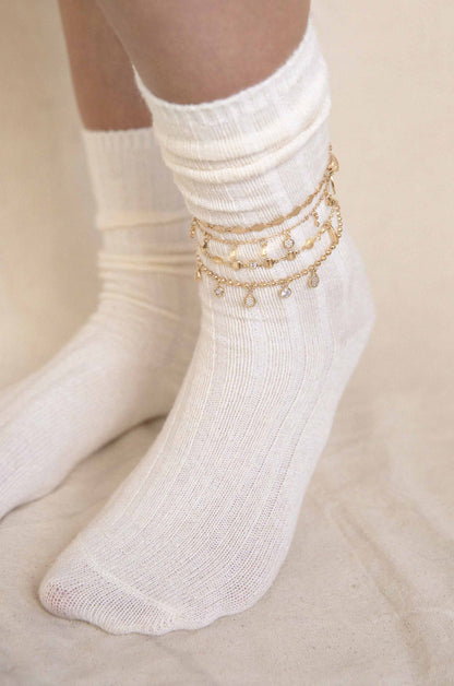 The More The Merrier 18k Gold Plated Anklet Set on a model