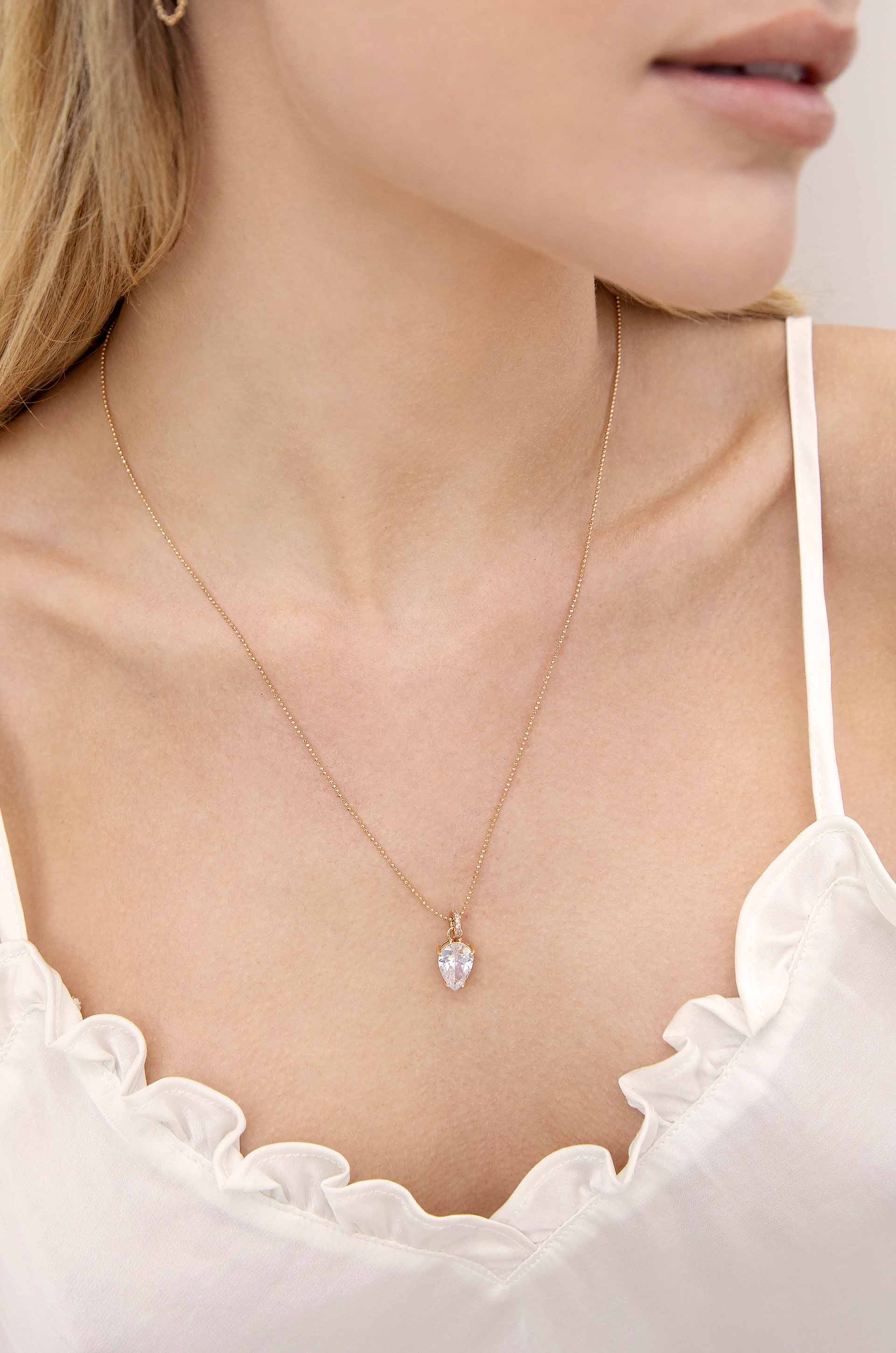 Thin and Delicate 18k Gold Plated Crystal Pendant Necklace on model