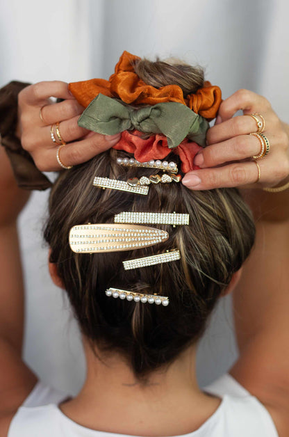 String Me Along Hair Pin Set shown on a model  