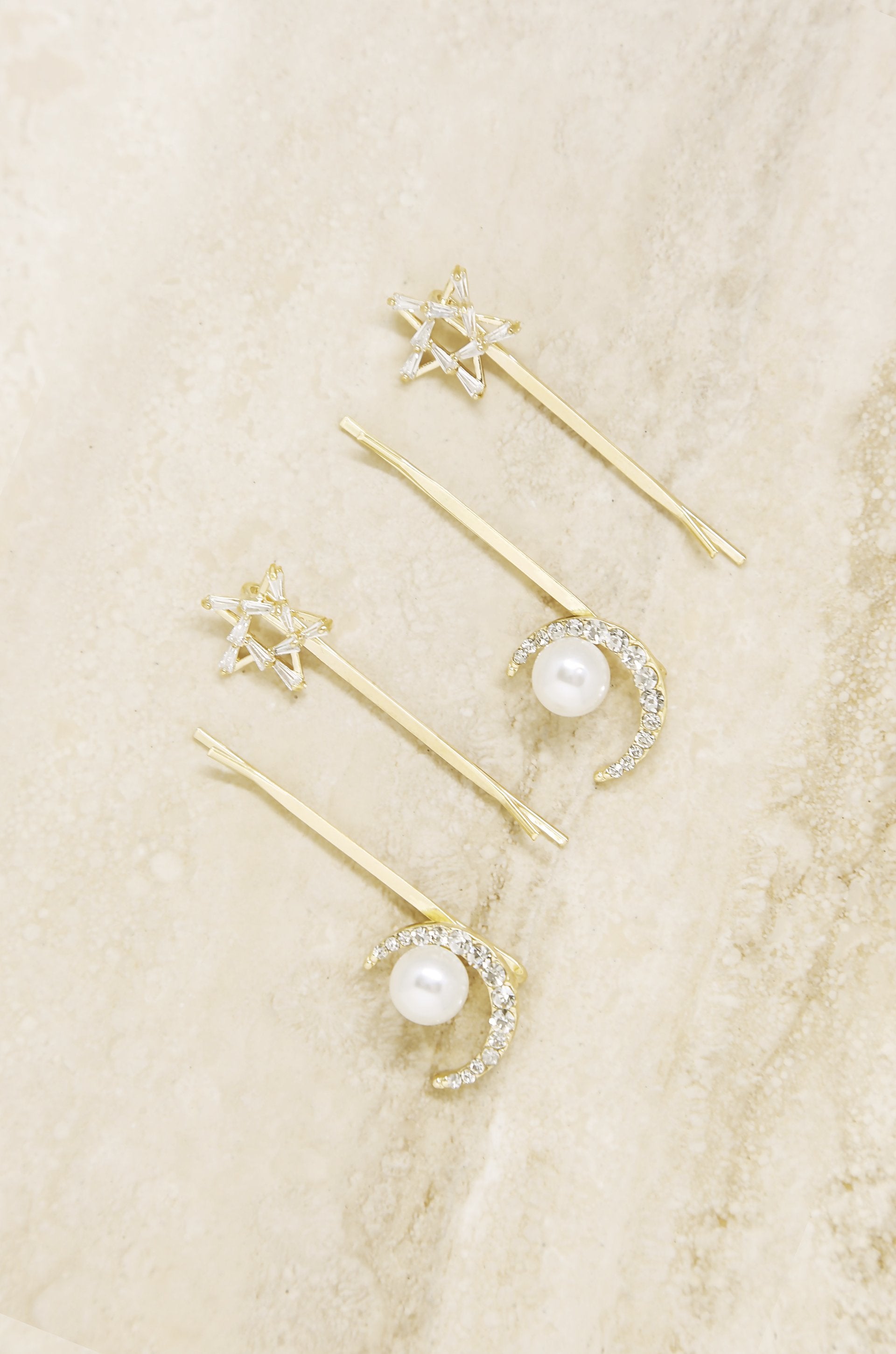 Spell Casting Crystal and Pearl Hair Pins on slate background  