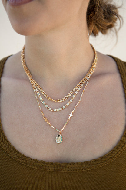 Mixed Layers 18k Gold Plated Necklace shown on a model  