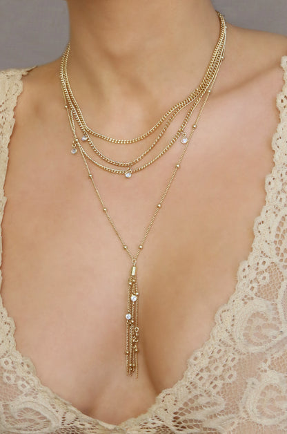 Layered Chain Drop Tassel 18k Gold Plated Necklace on slate background  