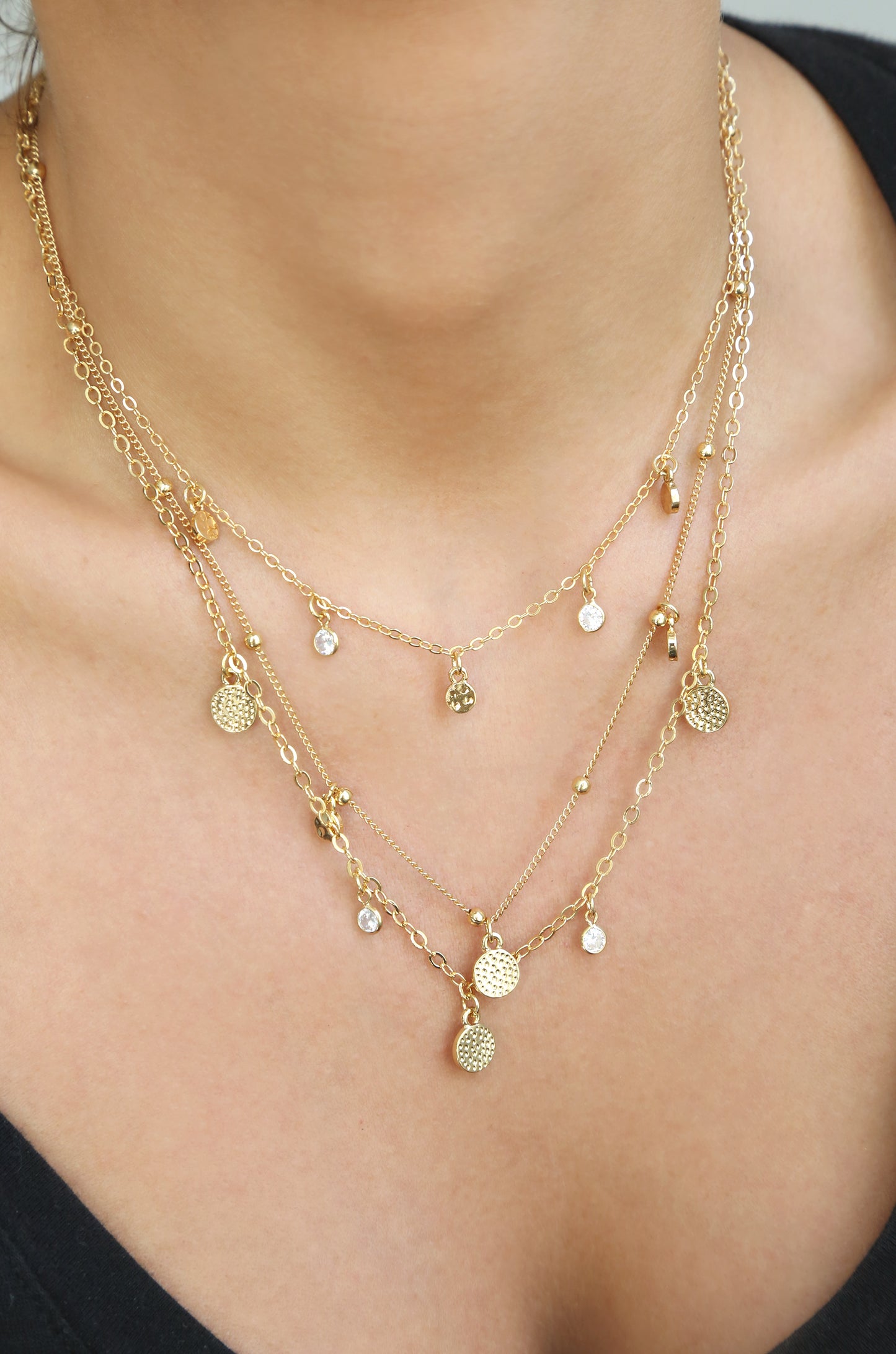 Crystal Detailed Triple Layer Necklace shown on a model  