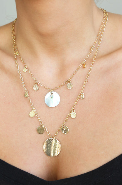 Pacific Princess Layered Shell Disc Necklace Set shown on a model  