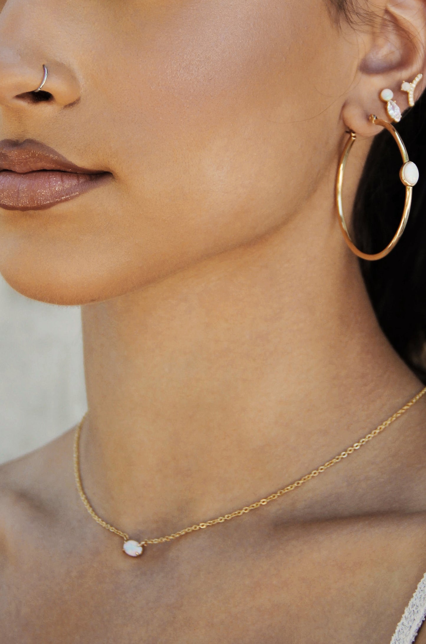 Keepsake Kyocera Opal & 18kt Gold Plated Necklace shown on a model  