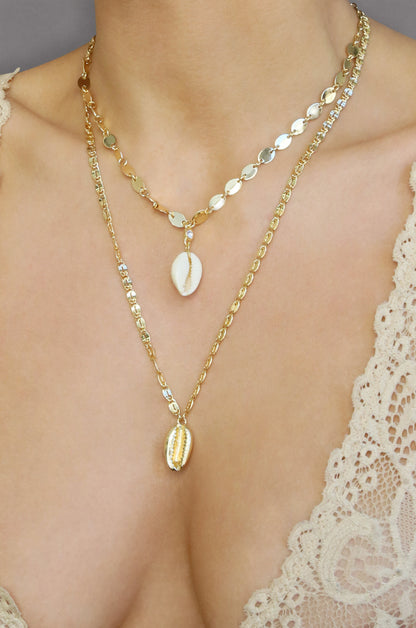 Double Cowrie Shell Layered 18k Gold Plated Necklace Set shown on a model  