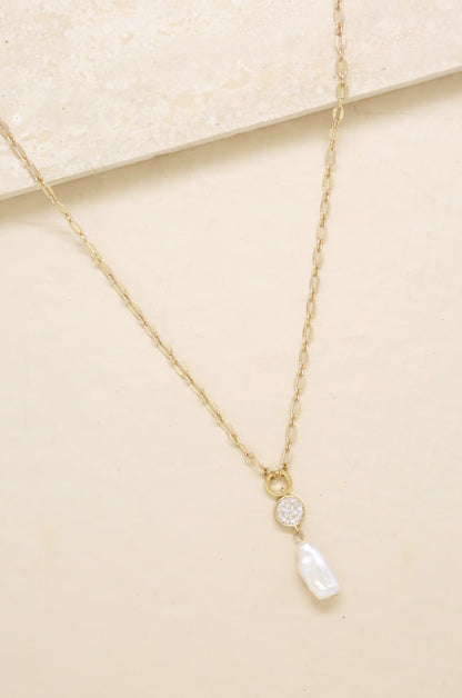 Dainty Vibes Freshwater Pearl 18k Gold Plated Necklace on slate background  