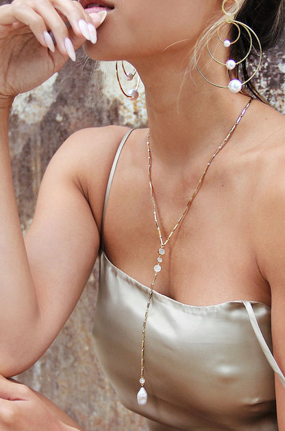 Elegant Freshwater Pearl and 18k Gold Plated Lariat Necklace shown on a model  