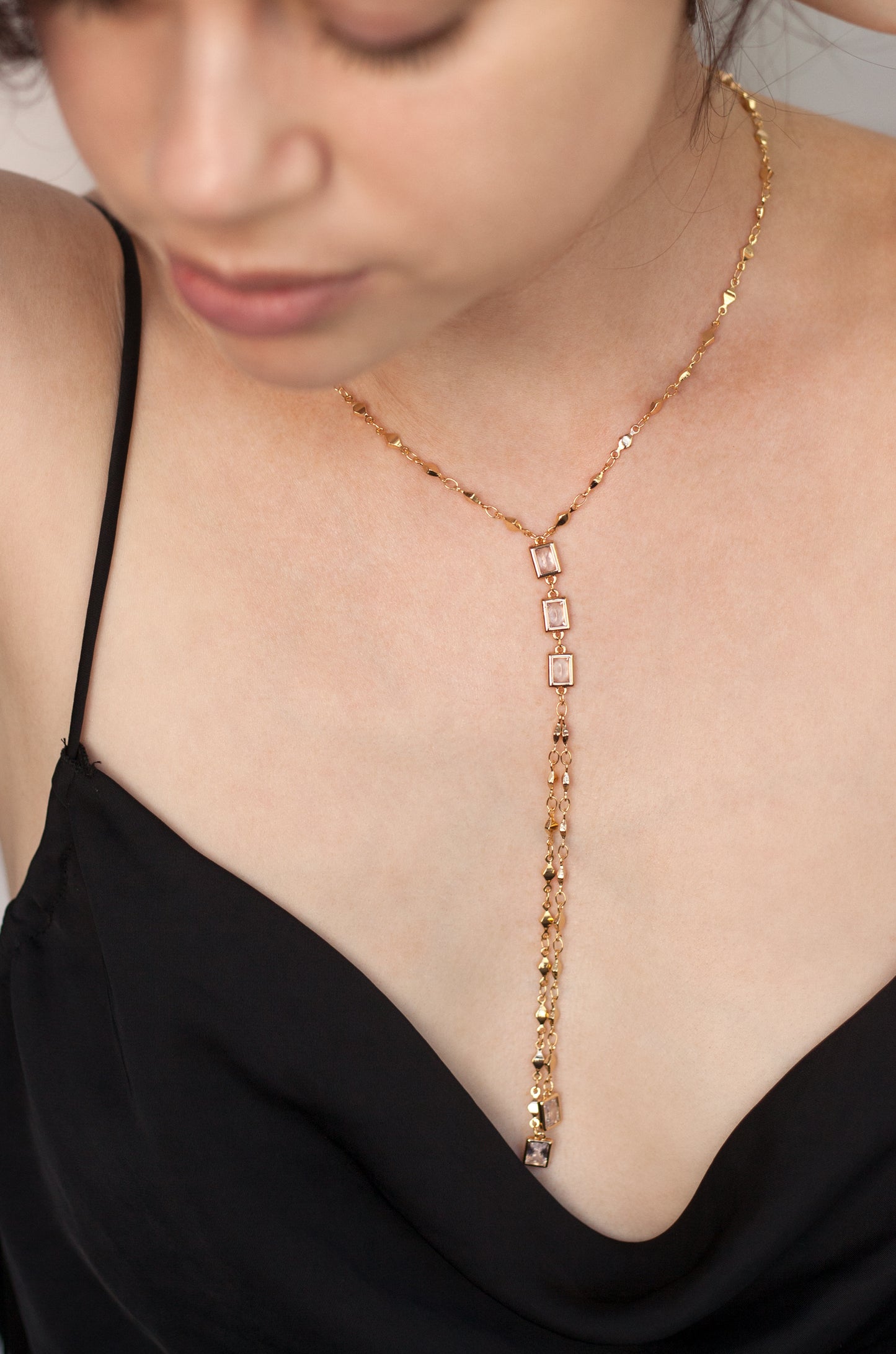 Behind the Glam 18k Gold Plated Necklace shown on a model  