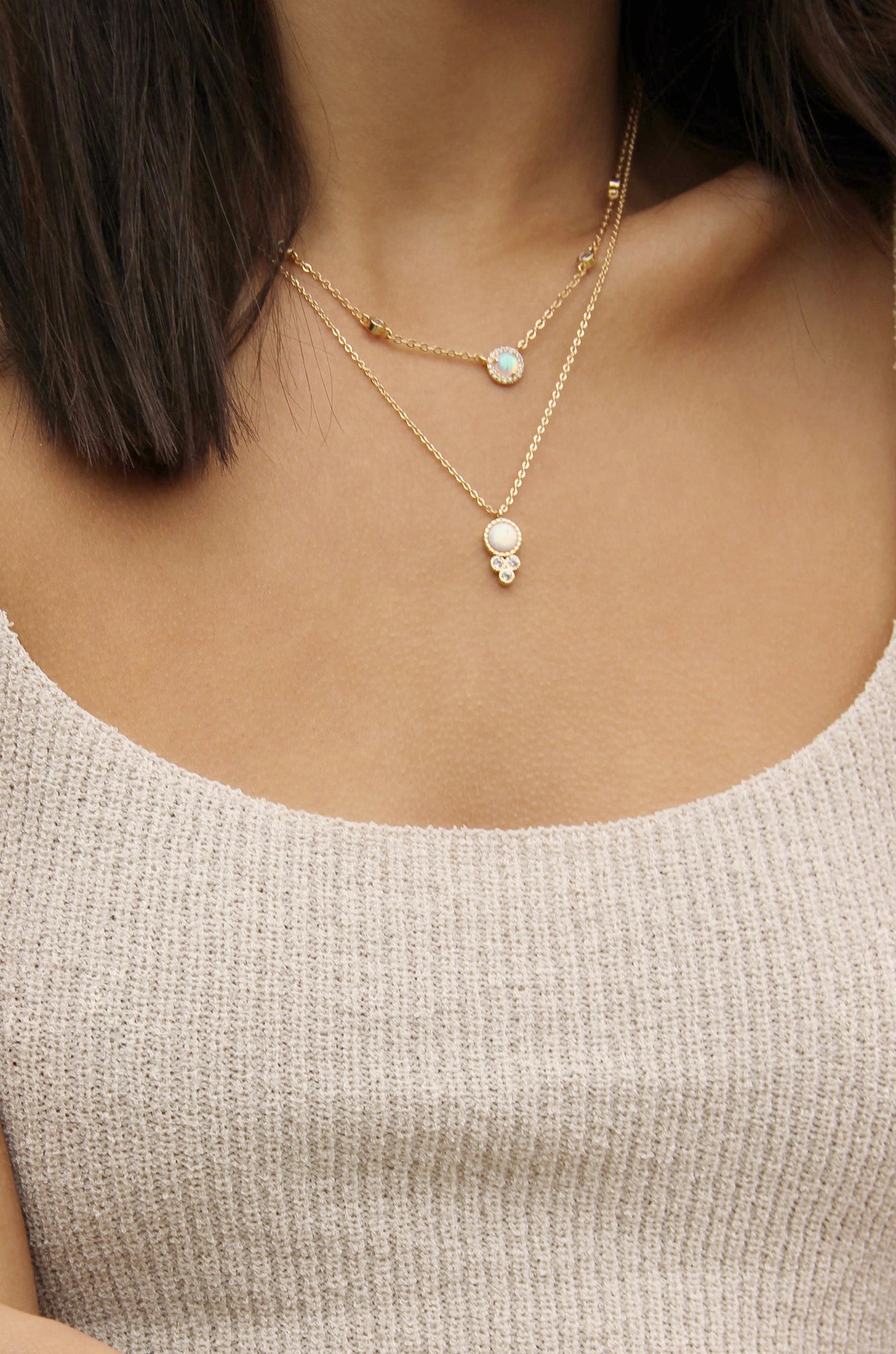 Olivia Opal and Crystal Necklace shown on a model  